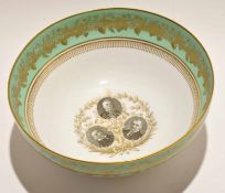 Copeland Spode bowl, the interior with photographs of the Chamberlain family within a green and gilt