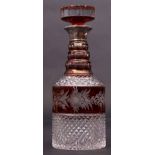 Early 20th century cut glass decanter, the middle and stem with ruby flashings engraved with flowers