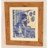 Framed collection of small Delft tiles featuring a kitchen scene in wooden frame, 32cm diam