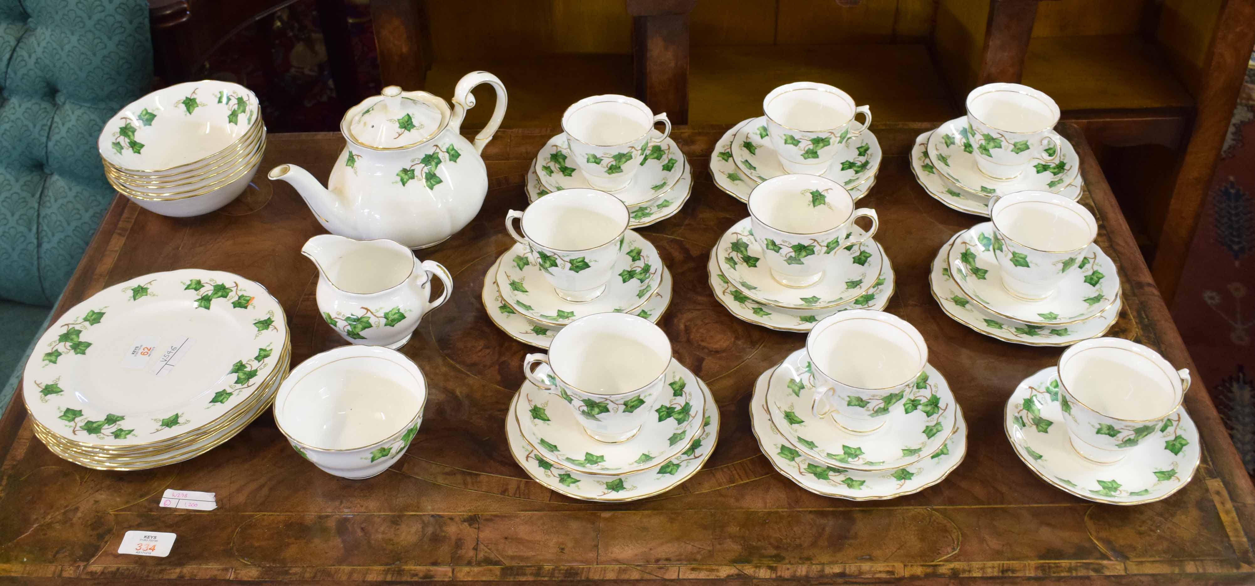 Quantity of Colclough tea set in an ivory pattern, some pieces with pattern number 8143, comprising