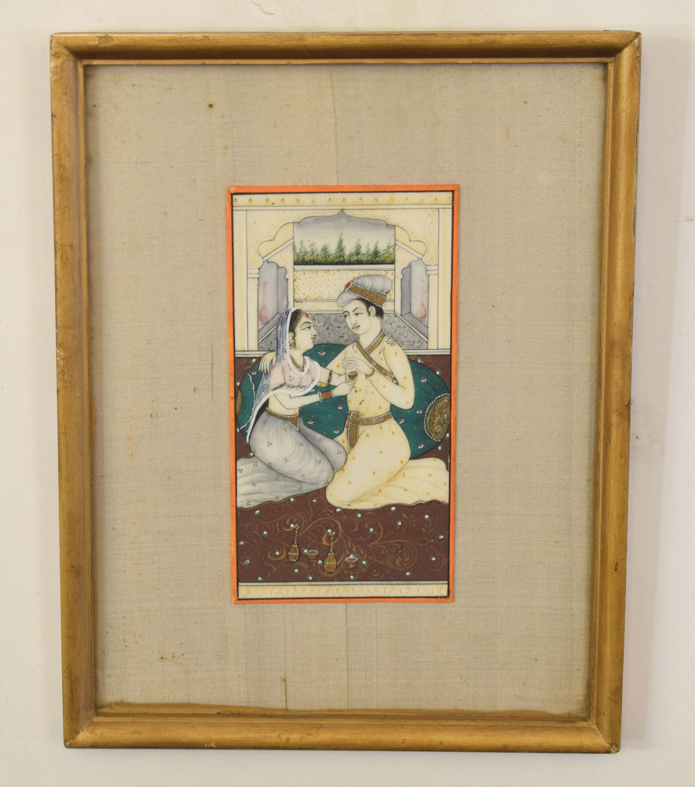 Moghul School, oil with gilt highlighting, Romantic couple, 12 x 6cm