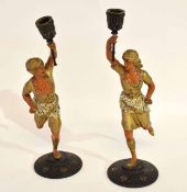 Pair of unusual gilded and painted spelter candlesticks in the form of Indian or Eastern torch