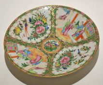 Large 19th century Chinese porcelain dish decorated in famille rose style with four panels, two with