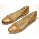 Pair of antique shaped treen and iron mounted shoe lasts, (2)