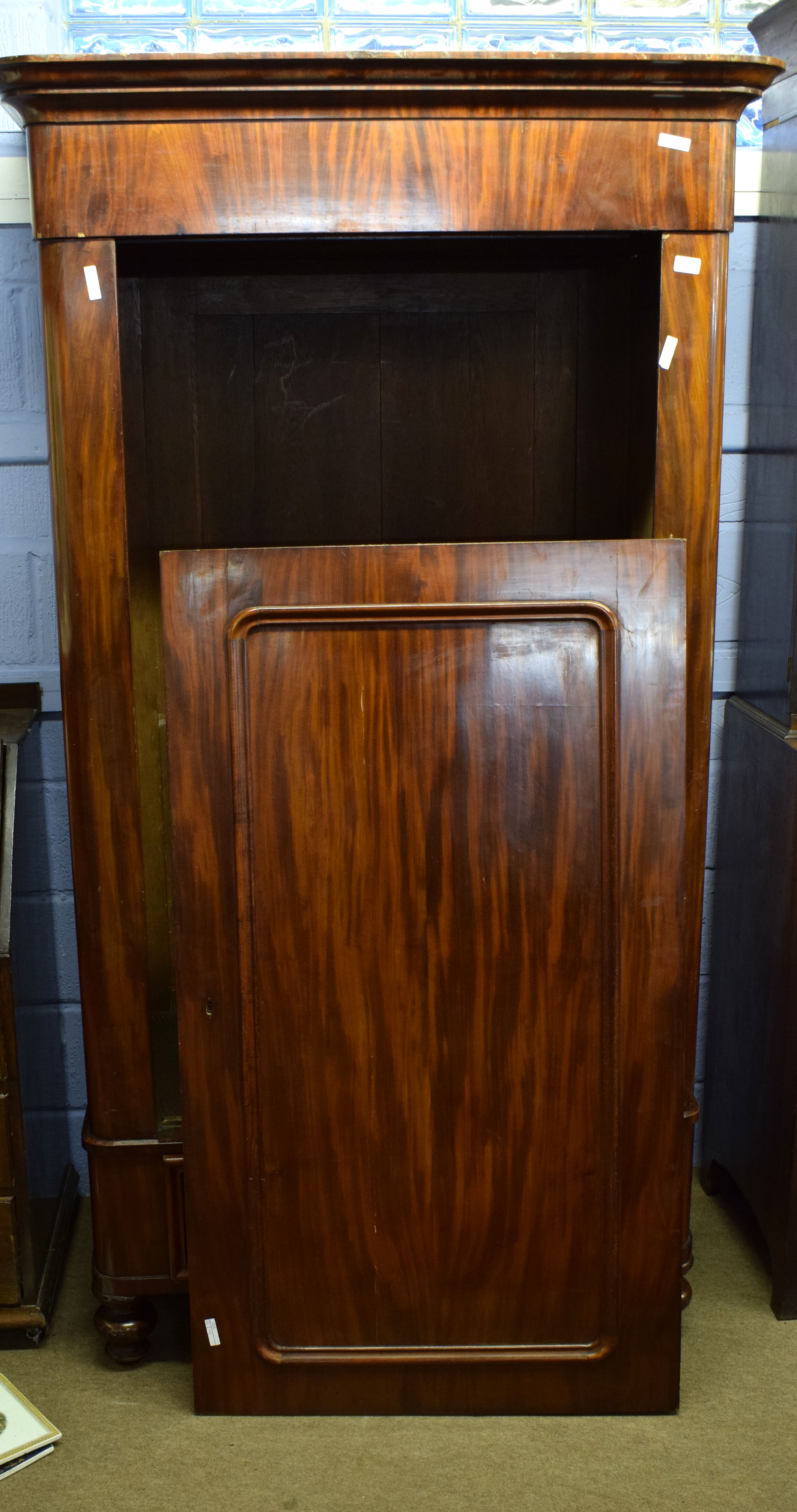 Beidermeier style mahogany hall wardrobe with moulded cornice over panelled door and single drawer