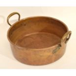 Large late 19th century copper pot with two lug handles, the base impressed "Benet Fink & Co,