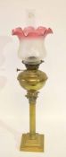 German Veritas brass Corinthian column oil lamp with glass shade with floral decoration and
