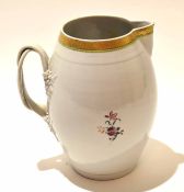 Large Chinese export porcelain barrel shaped jug with armorial to the front and floral sprays with