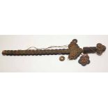 Unusual Oriental dagger made out of coinage stitched together with rope, 44cm long