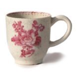 Early Lowestoft porcelain coffee cup with a pink monochrome design with line and loop dot border