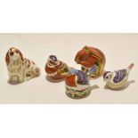 Group of five Royal Crown Derby paperweights, one modelled as a bird with silver stamp, another a