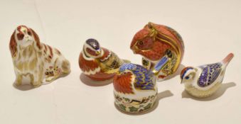 Group of five Royal Crown Derby paperweights, one modelled as a bird with silver stamp, another a