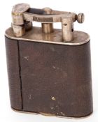 Early/mid-20th century Dunhill table lighter, leather clad with chromium or nickel mounts,