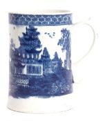 Lowestoft porcelain tankard, circa 1780, decorated with a blue printed design of a pagoda