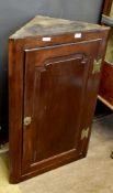 18th century oak wall hanging corner cupboard, single moulded panel door opening to reveal three