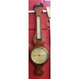 19th century wheel barometer, the wooden case with shell inlay, the dial manufactured by D Langston,