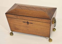 19th century mahogany sarcophagus shaped tea caddy, the interior fitted with three sliding lidded