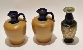 Two Royal Doulton stoneware jars and a Doulton vase (3), the vase 20cm high