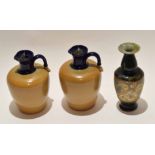 Two Royal Doulton stoneware jars and a Doulton vase (3), the vase 20cm high