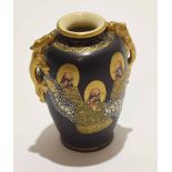 Small Japanese Satsuma earthenware vase decorated with Japanese characters and a sinuous dragon with