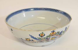 Mid-18th century London Delft punch bowl with a polychrome floral pattern (typical chips to rim