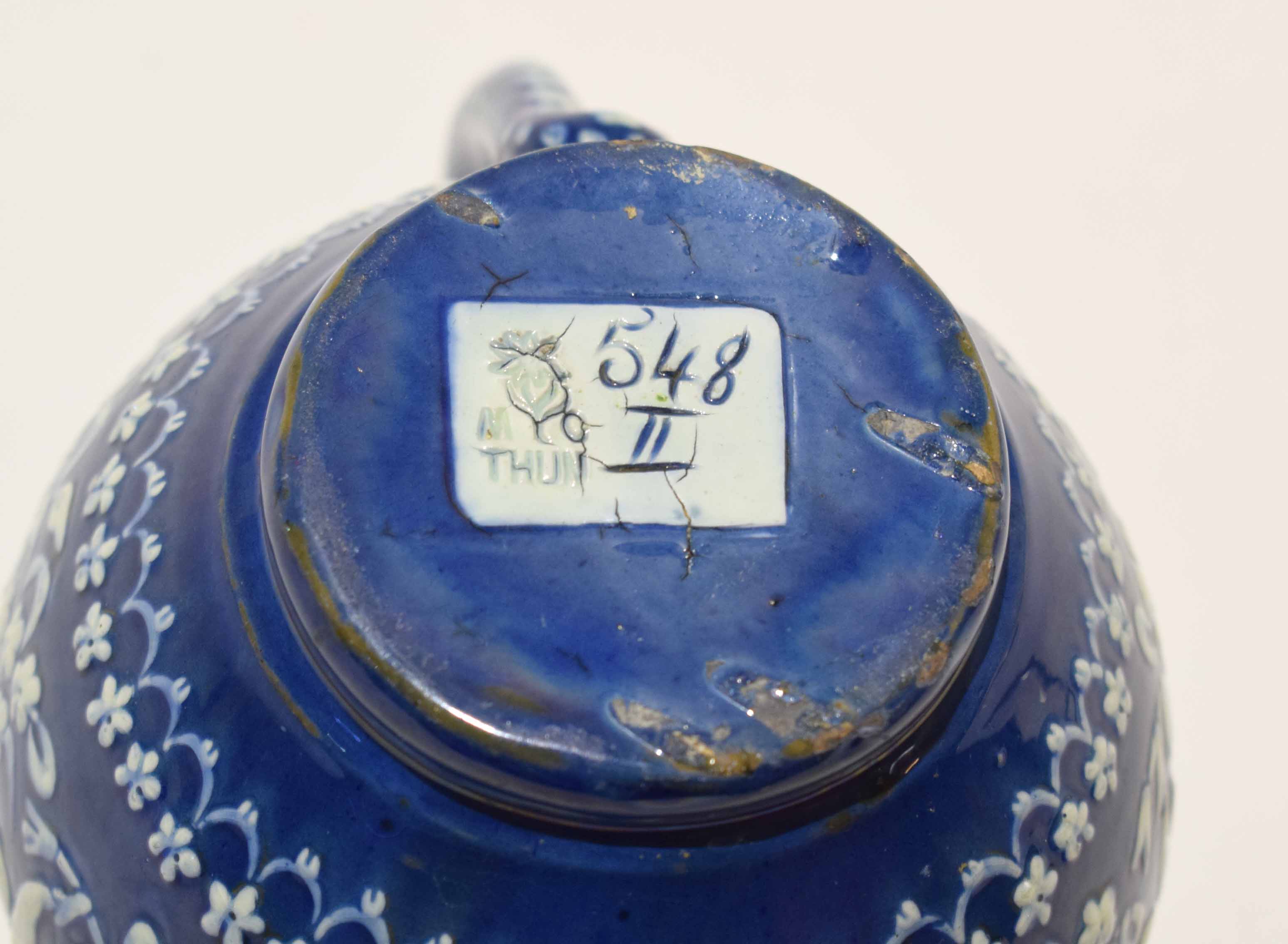 Thune Pottery jug, the blue ground decorated in white with floral sprays, 12cm high - Image 4 of 4