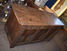 Oak large coffer, plain two plank top and panelled front on shortened stile feet, 127cm wide