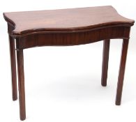 18th century mahogany fold-top tea table cross banded top, serpentined front over a plain frieze and