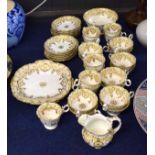 Extensive part tea set, mid-19th century, English porcelain Rockingham style, comprising 21 cups