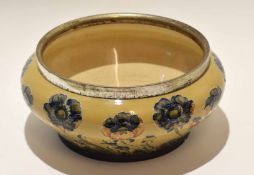 Early 20th century Moorcroft bowl with a Florian ware floral design with white metal rim, 22cm