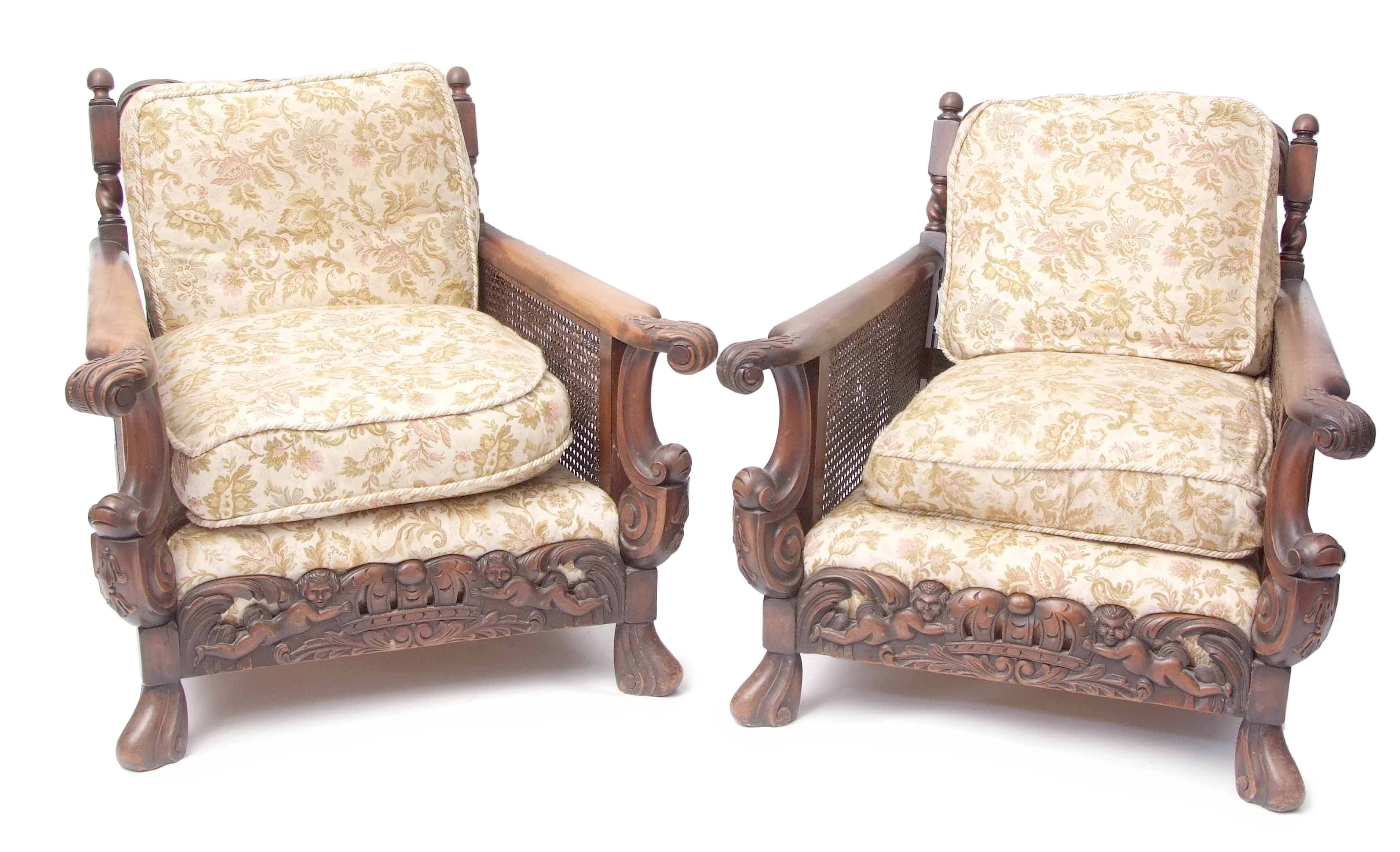 Late Victorian mahogany Bergere suite comprising a three-seater sofa and two matching easy chairs,