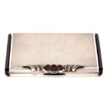 Early 20th century black composite mounted and white metal powder compact of rectangular form with