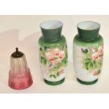 Pair of glass vases with polychrome decoration of flowers, together with a cranberry glass shade