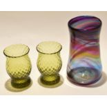 Pair of green glass vases and a large Art Glass baluster vase with streaked purple design, 24cm high