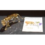 Swarovski silver crystal model of a tiger with amber colouring, complete with certificate and