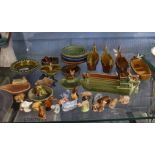 Extensive quantity of Wade pottery items including small dishes, two small boat shaped flower
