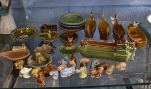 Extensive quantity of Wade pottery items including small dishes, two small boat shaped flower
