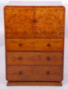 Art Deco walnut cabinet of two doors over three drawers, 75cm wide