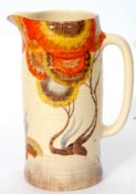 Large Clarice Cliff jug, the ribbed body with Rhodanthe design (cracked), 28cm high