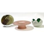 Three pieces of studio glass including a circular vase, mushroom shape, with ribbed design in pink