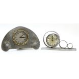 Liberty style alarm clock with hammered pewter surround, the reverse marked "L & Co Homeland No