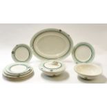 Group of Clarice Cliff dinner wares decorated with a green ringed geometric design comprising two