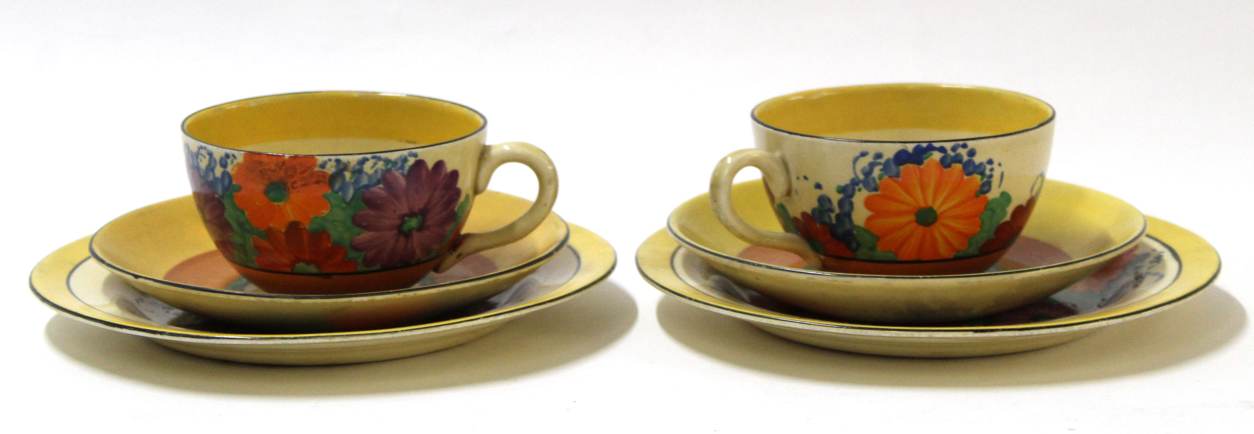 Two Clarice Cliff Gay Day trios, decorated with floral pattern with Bizarre back stamp to base (6) - Image 2 of 4