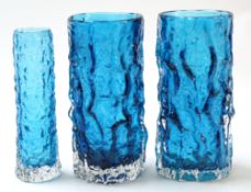 Group of Whitefriars type vases with blue design, including a pair of vases and smaller