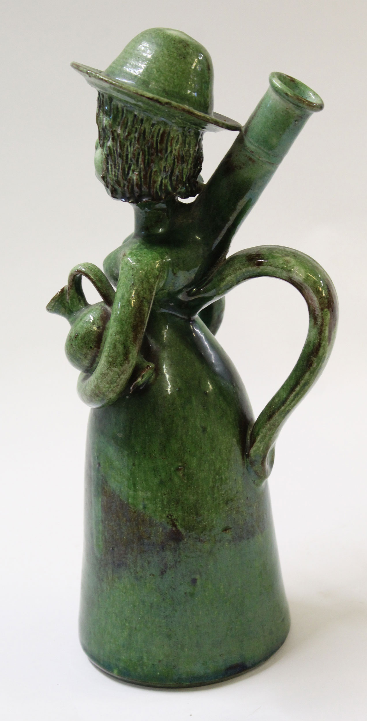 Unusual pottery sculpture of a woman with jar under her arm, green glazed with monogram JJ to - Image 4 of 5