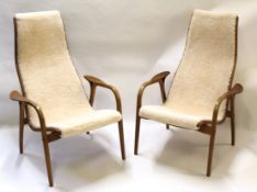 Mid-century pair of teak Swedese Lamino lounge chairs with sheepskin seats, probably by Yngve