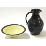 Studio Pottery jug with purple glaze and artist's signature to base, together with a yellow glazed