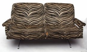 Howard Keith (HK Furniture) two seater sofa upholstered in a zebra stripe type pattern, raised on