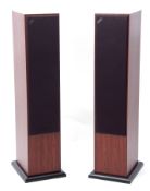 Pair of acoustic energy AE109 loudspeakers with black bases, complete with owner's manual etc,