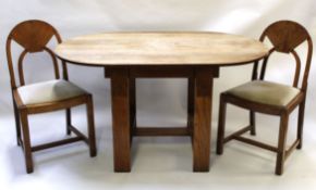 Early 20th century Arts & Crafts style oak dining table and four chairs, table length 141cm